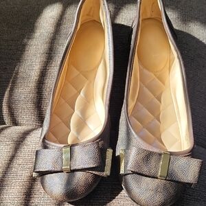 MICHAEL Michael Kors Brown Flats with Gold Bow Detail